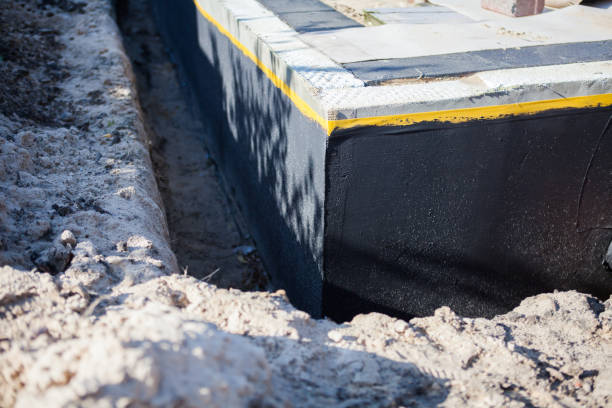 Professional Exterior Waterproofing technician working in Waynesville, NC